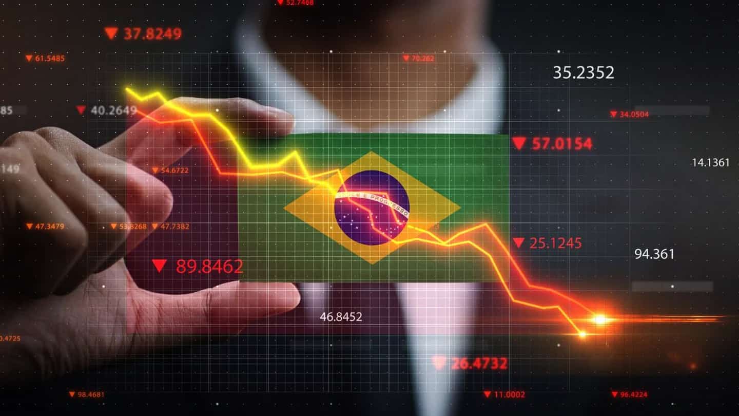 Gráfico de mercado em queda sobre a bandeira do Brasil